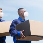moving company team packing household items safely